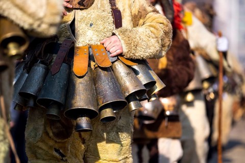Participants take part in the International Festival of Masquerade Games Surva. The festival