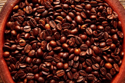 Coffee beans in a clay dish with nice texture