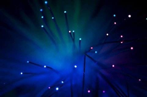 Optical fibers of fiber optic cable. Internet technology.Blue color
