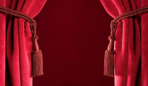 Red theatre curtains and red tassels
