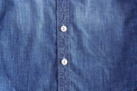Denim blue jeans shirt with buttons detail texture