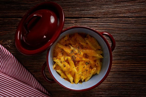 Macaroni and cheese italian pasta recipe on wood table