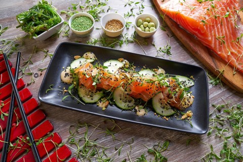 Wakame algae salad with salmon wasabi sesame and sprouts