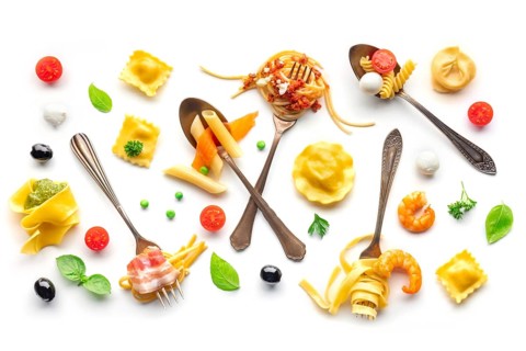 Various pasta forks. Spaghetti, fusilli, penne and other shapes of pasta, with sauce, overhead flat