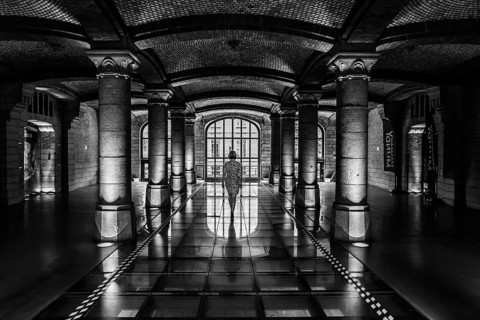 Woman in the Royal Depot warehouse of Thurn and Taxis, Brussels, belgium, August 2017