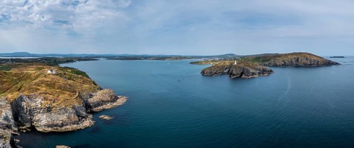 A panorama view of the entrance to the Baltimore Harbor in West Cork with teh Sherkin Island