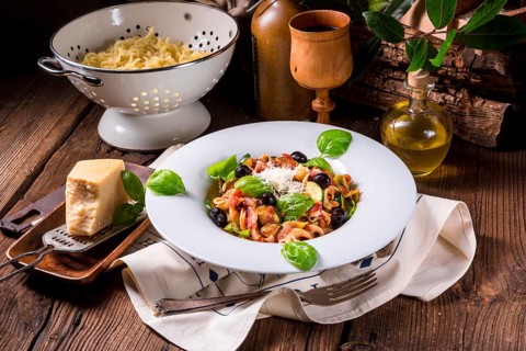 Ribbon Pasta with courgette and olives in tomato sauce
