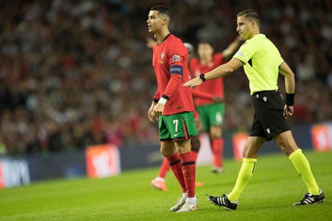 Football match, captain Cristiano RONALDO CR7 Portugal has just shot a free kick with his right