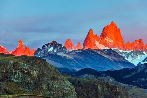 The grand crimson dawn over the mountain range Fitzroy. Mountain peak in Patagonia. Magnificent