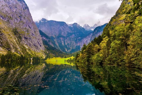 Koenigssee - the cleanest lake in Germany is surrounded by high mountains. The fabulous beauty in