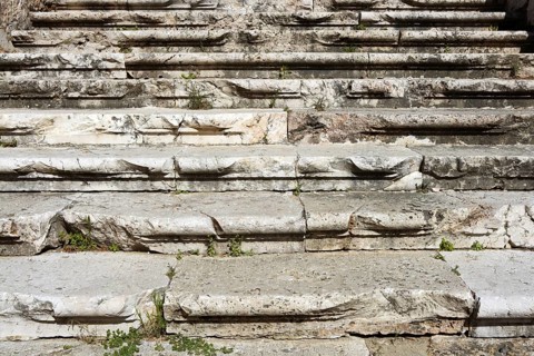 Aged weathered ancient roman stairs castle stairway in Spain