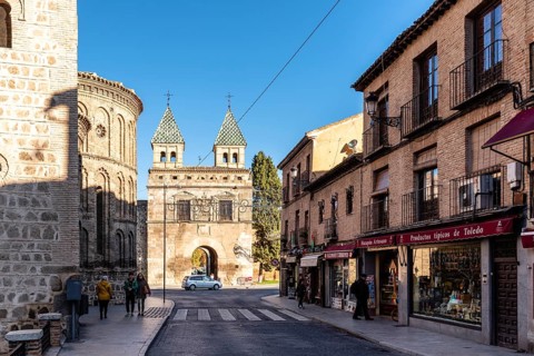 Toledo, Spain, December 6, 2019: The New Bisagra Gate and Santiago del Arrabal church. Real del