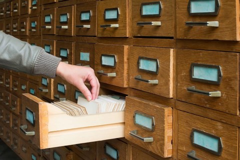 Old archive with wooden drawers