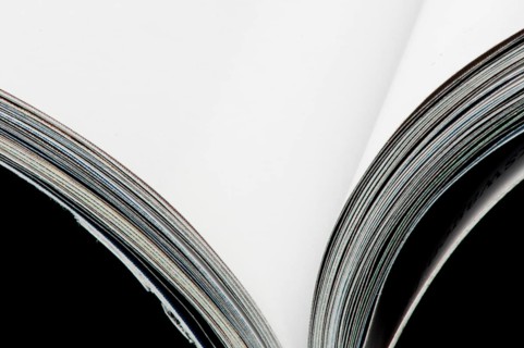 Open magazine blank pages. Close up