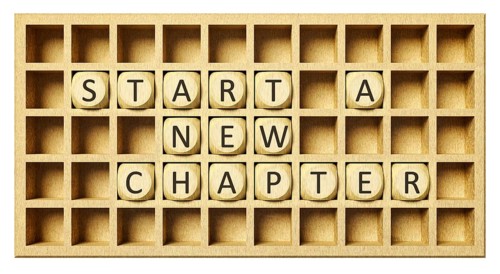 A wooden grid with cubes start a new chapter 3d illustration