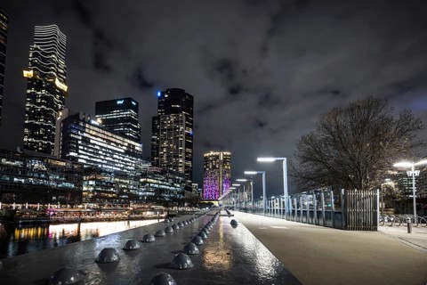 MELBOURNE, AUSTRALIA - JULY 5, 2024: Melbourne skyline as seen at dusk from Sandridge Bridge near