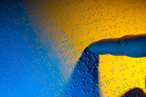 A book written in Braille for the blind. Braille for the blind, A book written in Braille. Braille