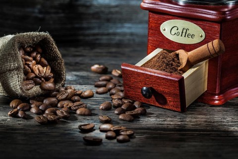 Very close up view on coffe products on vintage wood