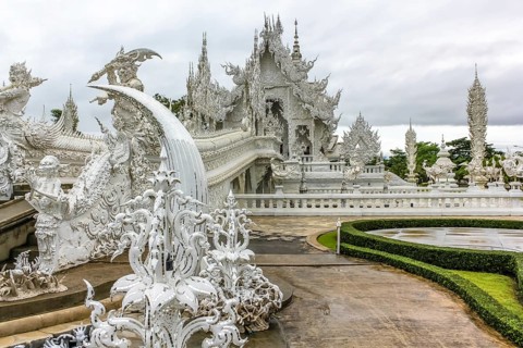 The spectacular Wat Rong Khun called White Temple during the rainy season, Chiang Rai, Northern