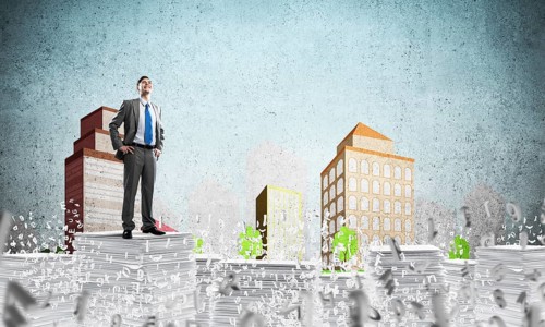 Confident businessman in suit standing on pile of documents among flying letters with drawn