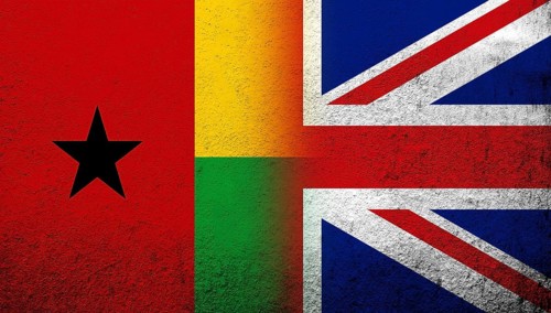 National flag of United Kingdom (Great Britain) Union Jack with The Republic of Guinea-Bissau