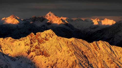 Mountains around Plansee in Reutte Tyrol in winter with snow at sunrise
