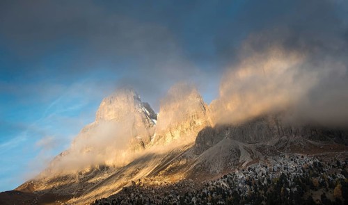 Foggy mountain landscape of the picturesque Dolomiti at Passo Sella area in South Tyrol in Italy