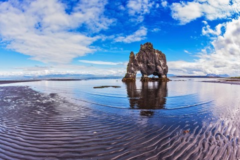 Stone mammoth Iceland. The picturesque cliff in Bay of Hoonah. Hvitserkur rocks during low tide at