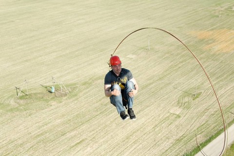 Jumping with a rope.extreme man jumping from a great height.jumping with a rope.flying down on the