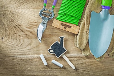 Safety gloves shovel soft twist tie secateurs chalkboard price sign tag agriculture concept