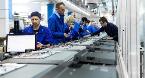 Conveyor for the production of television sets. Testing TVs in the workshop. Electronics Assembly