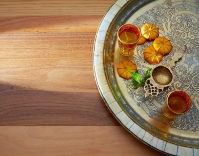 Green tea with mint Moroccan style on silver tray and biscuits