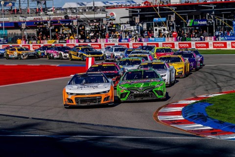 NASCAR Cup Series driver, AJ ALLMENDINGER (16), races through the turns during the Bank of Amercia