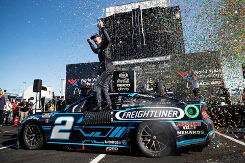 Austin Cindric celebrates after winning the Enjoy Illinois 300 at the World Wide Technology Raceway