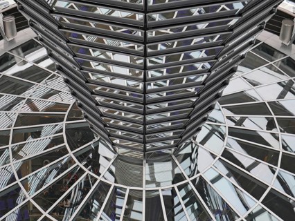 Reflections in glass and metal in the dome of the Reichstag. Berlin, Germany, Europe