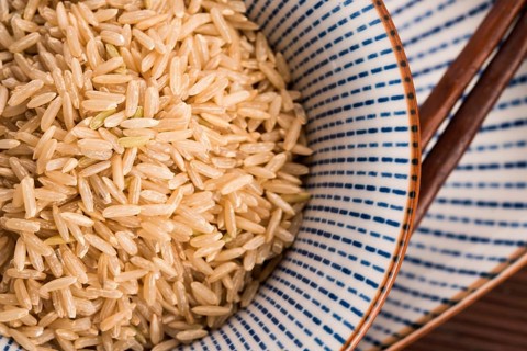 Raw brown rice in a bowl