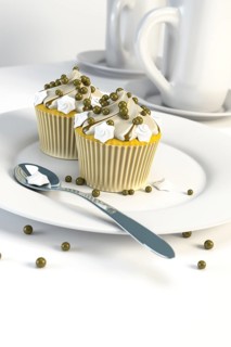 3d rendering of two delicious cupcakes on a plate