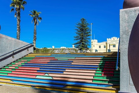 Multi-colored picturesque staircase descends to the port. Cape Town is a fabulous port city on the