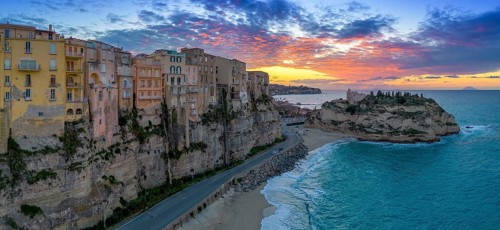 Tropea, Italy, 16 December, 2023: panorama view of Rotonda Beach and the colourful old town of