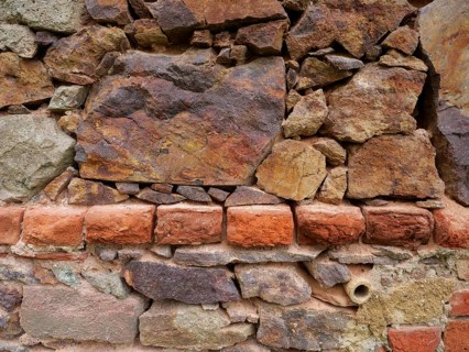 Freestyle: fieldstone, porphyry and brick, textured background structure, rustic stone background