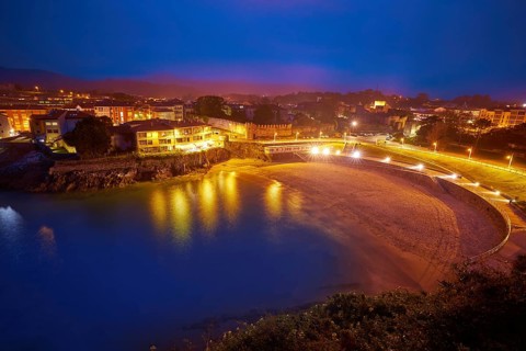 Llanes Playa del Sablon beach sunset in Asturias of Spain