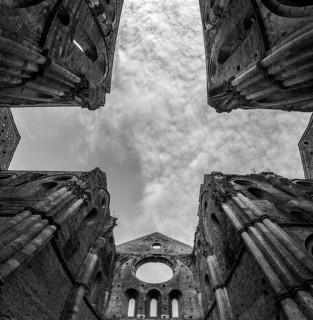 Missing ceiling opening the view to the sky in the destroyed abandoned Cistercian monastery San