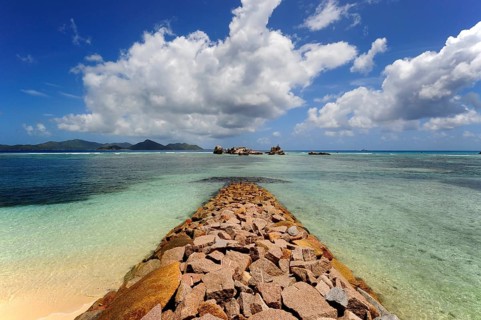 Breakwater in front of the harbour of La Passe, La Digue Island, the Seychelles, Indian Ocean