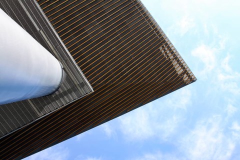 View up the pillar to the top of the roof