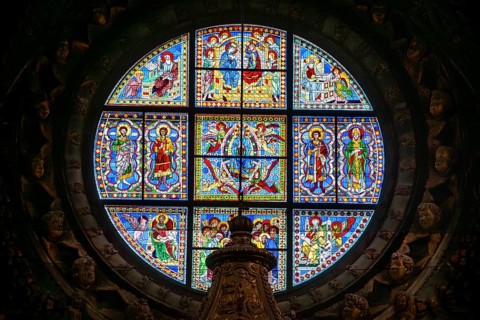 SIENA, ITALY, SEPTEMBER 23, 2023, Rich ornate window with mother mary above the presbytery of the