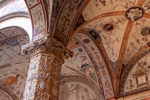 Wall frescoes of rich decorated courtyard of Palazzo Vecchio in Florence, Italy, Europe