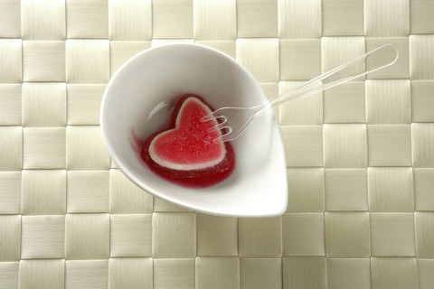 Eat a jelly strawberry bloody heart romantic metaphor