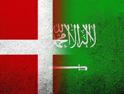 The Kingdom of Denmark National flag with The Kingdom of Saudi Arabia National flag. Grunge