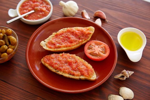 Bread toasted slices with grated tomato Catalonia style pan tomaquet