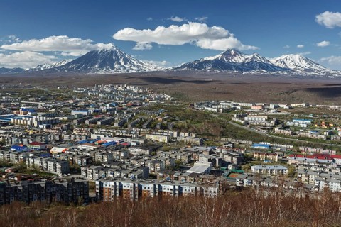 Panoramic view of the city Petropavlovsk-Kamchatsky and volcanoes: Koryaksky Volcano, Avacha